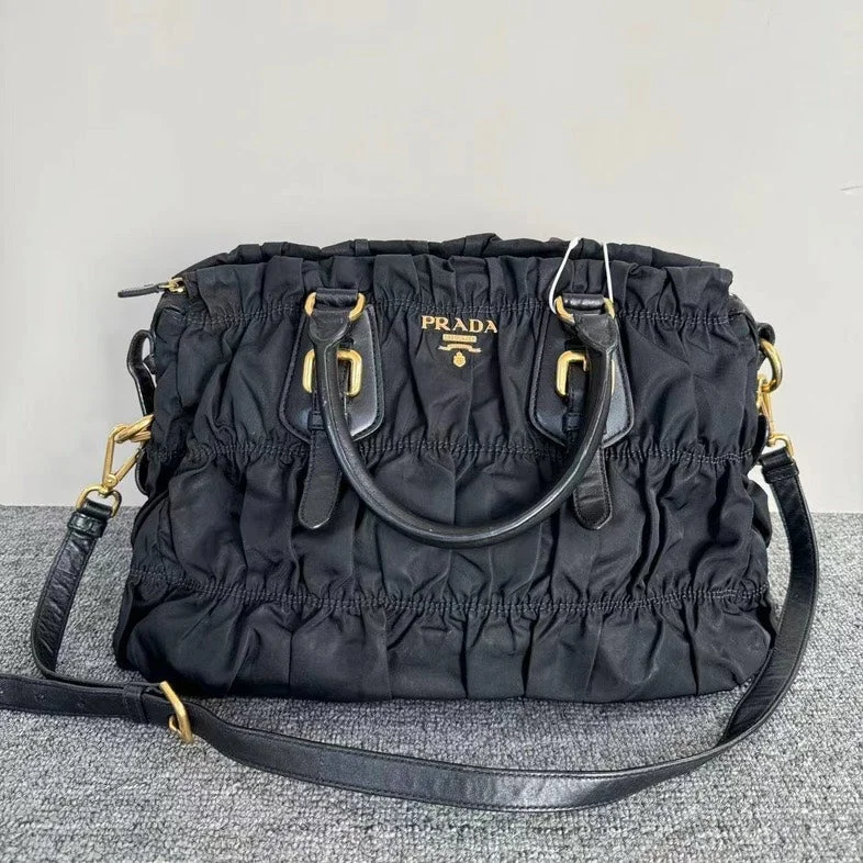 Prada bags with a front - zip pocket for small items like cards and keysPrada Black Nylon Tessuto Gaufre Tote Bag Medium