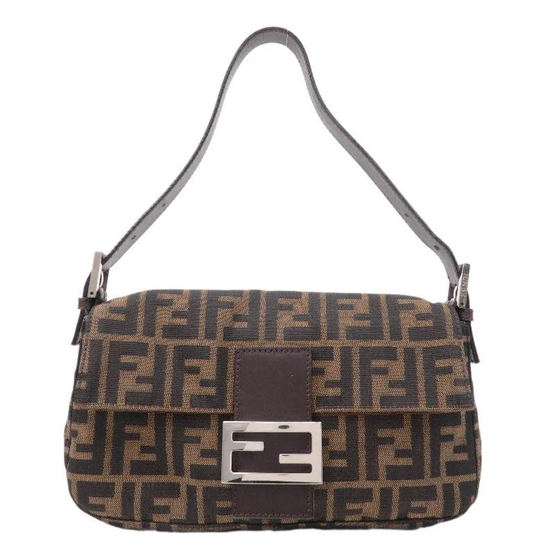 Small - sized Fendi crossbody bags in smooth calfskin leather for a compact and stylish carryFENDI Mamma Baguette Zucca Canvas Leather Shoulder Bag Brown 26424