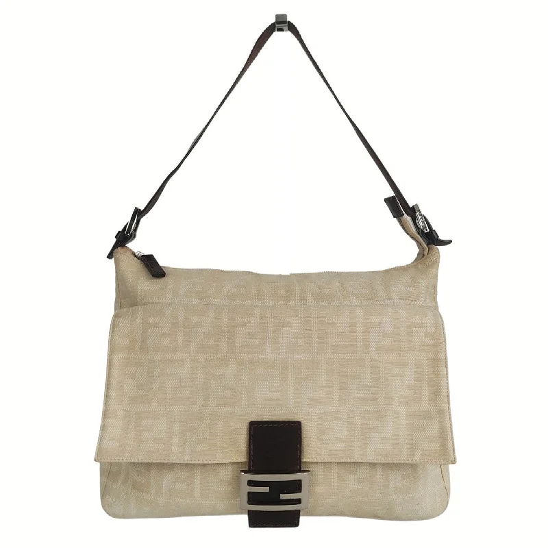 Fendi Sunshine Shopper bags with a structured silhouette and a magnetic - snap closureFENDI Mamma shoulder bag in beige monogram canvas