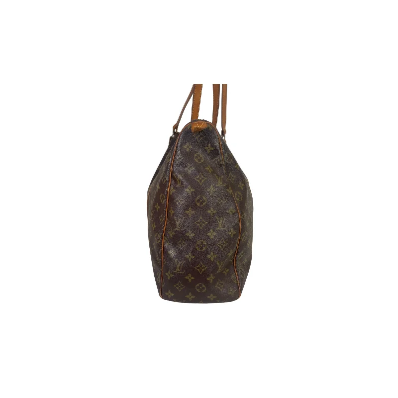 Ladies Louis Vuitton Petite Malle bags with a star - shaped charm for cutenessLouis Vuitton Flanerie Monogram Canvas