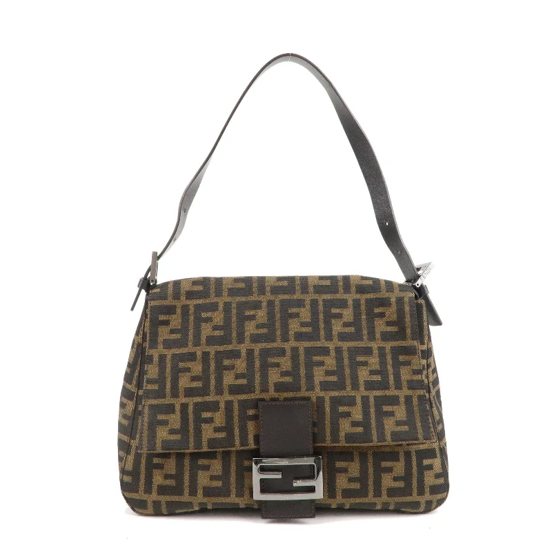 Fendi By The Way bags with a crystal - embellished FF logo for added luxury and glamourFENDI Mamma Baguette Zucchino Canvas Leather Shoulder Bag 8BR001