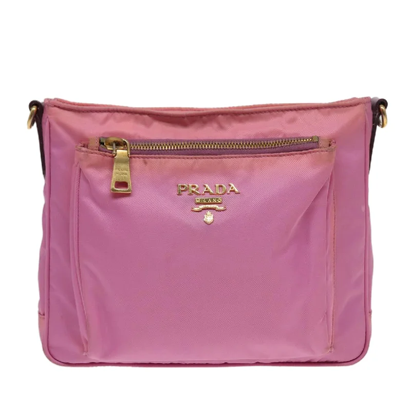 Prada Cleo bags with a contrast - colored interior for visual interestPRADA Tessuto Shoulder Bag