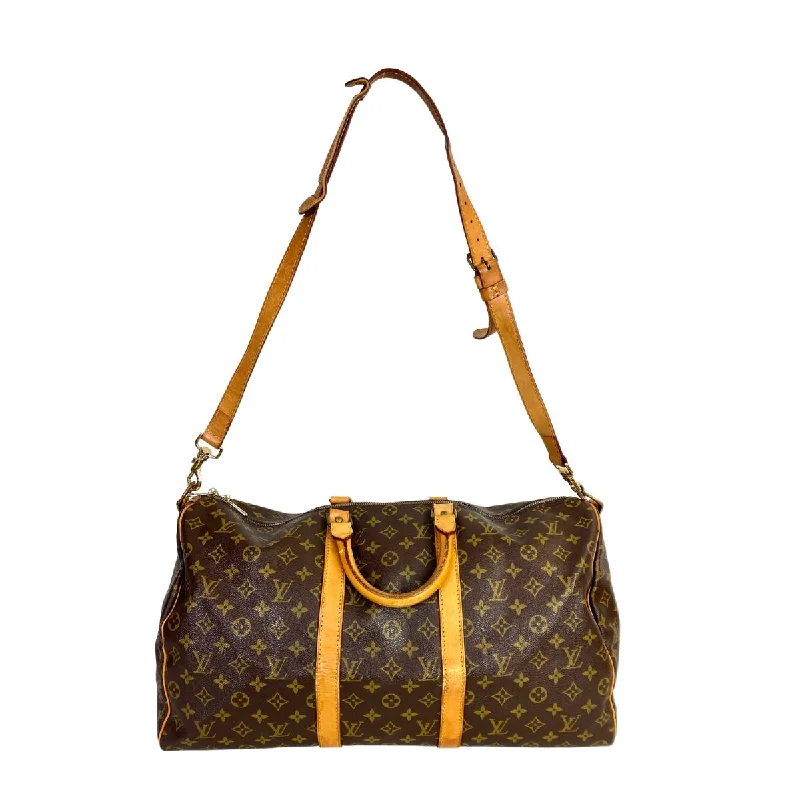 Louis Vuitton bags with a snap - button closure and a decorative charm for styleLouis Vuitton Keepall 50 Bandoulière Strap Monogram Canvas