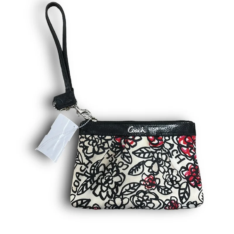 Ladies Coach shoulder bags with a magnetic - closure flap for easy accessWristlet Designer By Coach  Size: Small