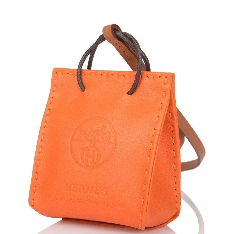 Sporty - Inspired Hermes Bags for Active LifestylesHermes Orange Mini Shopping Bag Charm