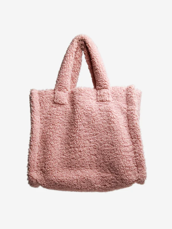 Hermes Kellydoll Bags for a Playful and Chic LookPink faux fur bag